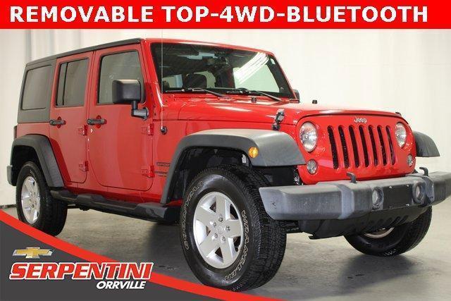 used 2014 Jeep Wrangler Unlimited car, priced at $18,509