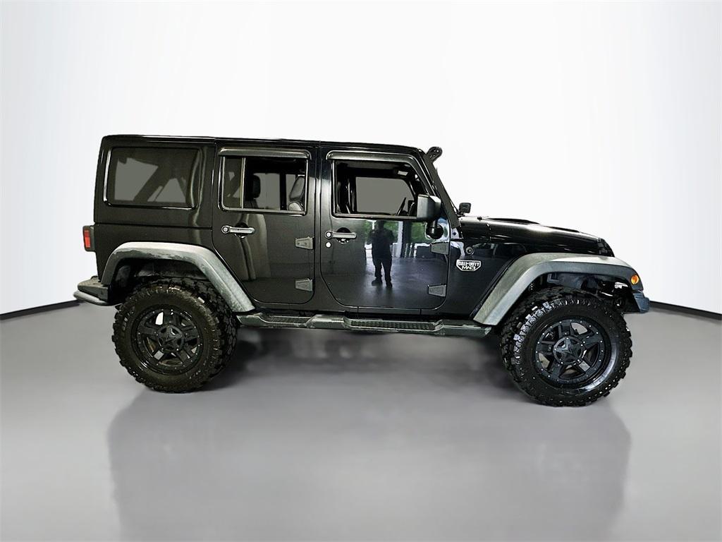 used 2012 Jeep Wrangler Unlimited car, priced at $22,850