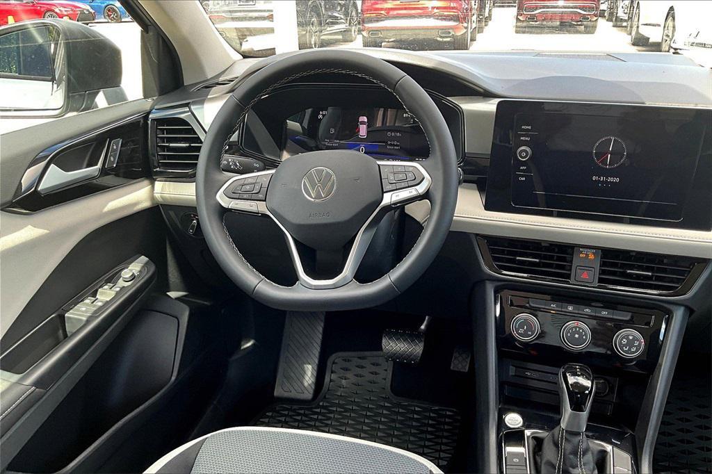 new 2025 Volkswagen Taos car, priced at $25,984
