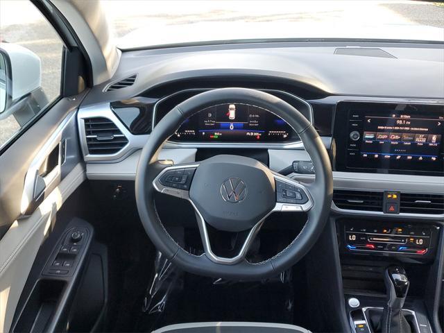 used 2025 Volkswagen Taos car, priced at $27,650