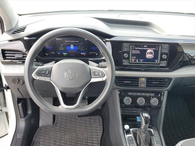 used 2024 Volkswagen Taos car, priced at $22,500