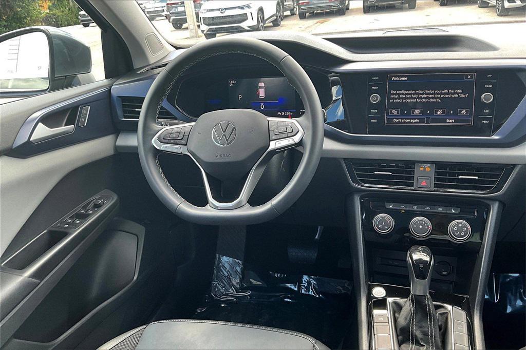 used 2023 Volkswagen Taos car, priced at $21,450