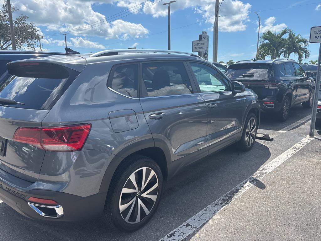used 2023 Volkswagen Taos car, priced at $21,450