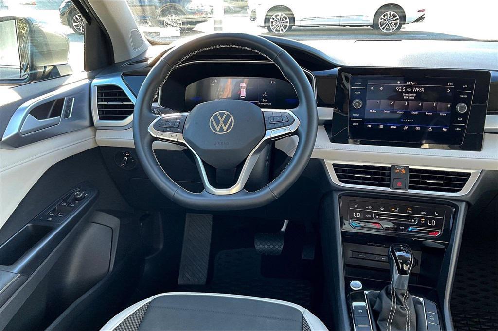 used 2025 Volkswagen Taos car, priced at $25,249