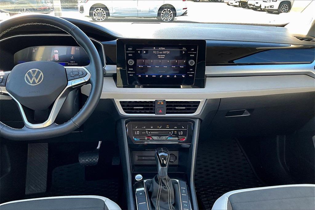 used 2025 Volkswagen Taos car, priced at $25,249