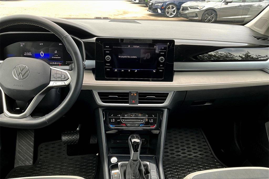 used 2025 Volkswagen Taos car, priced at $25,985