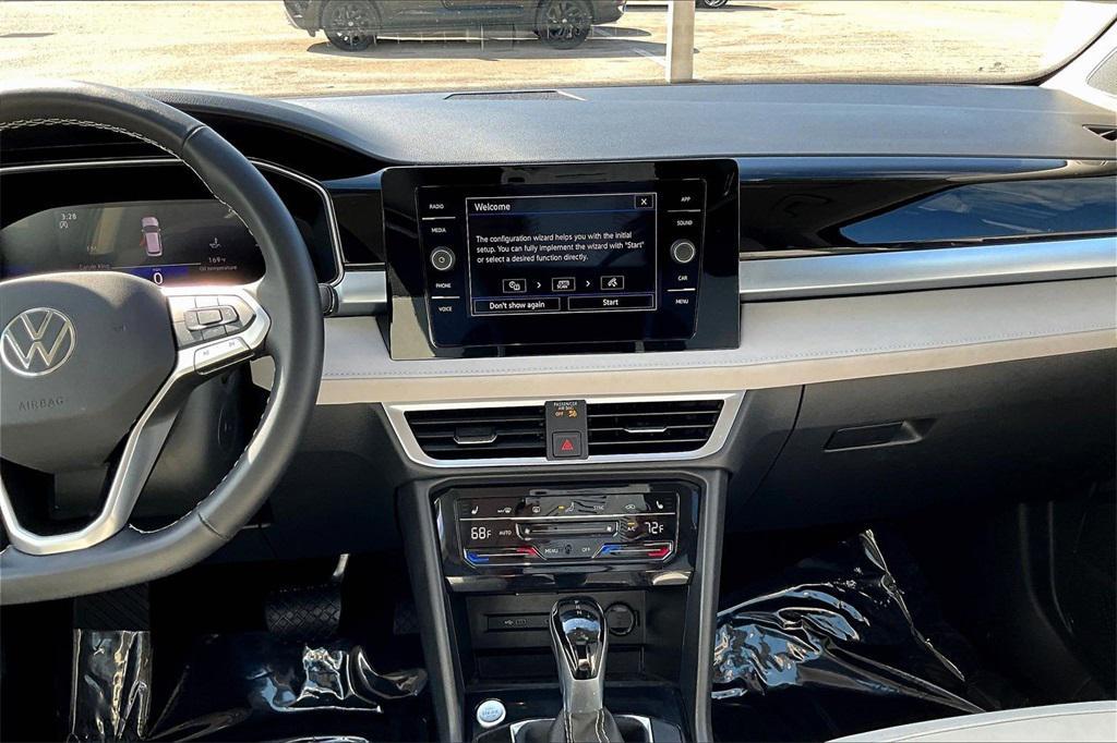 used 2025 Volkswagen Taos car, priced at $24,995