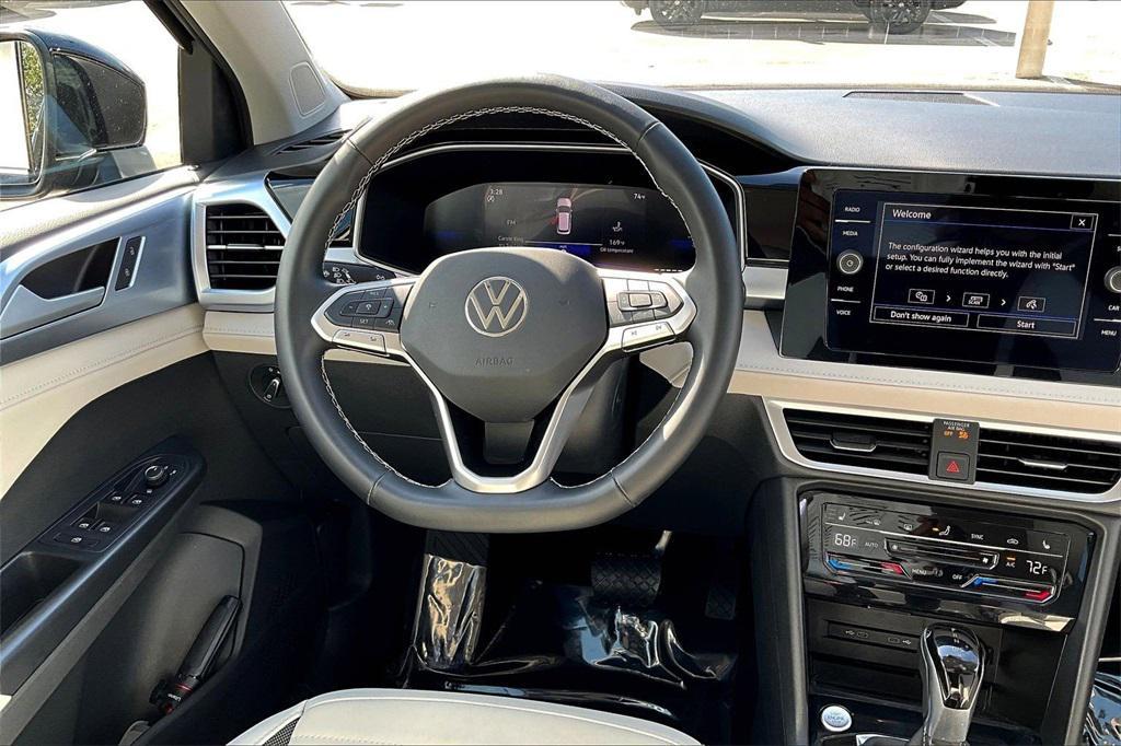 used 2025 Volkswagen Taos car, priced at $24,995