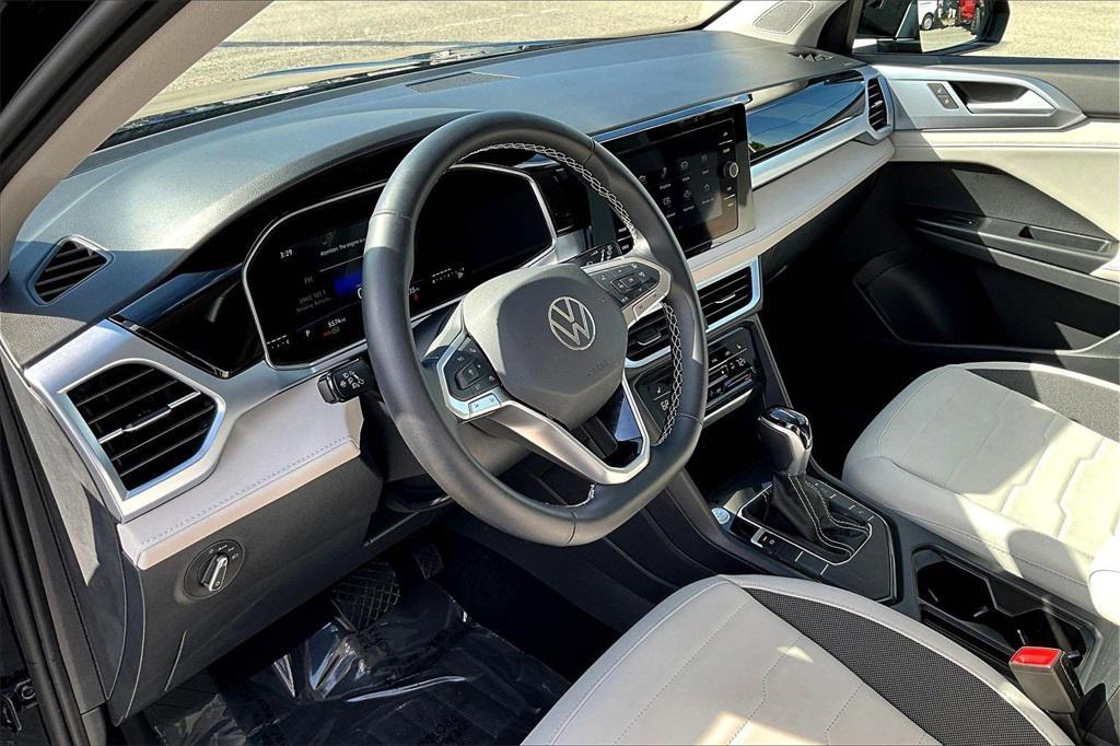 used 2025 Volkswagen Taos car, priced at $24,995