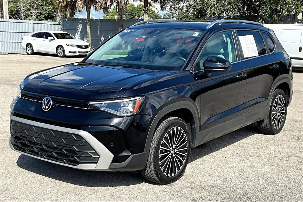 used 2025 Volkswagen Taos car, priced at $24,995