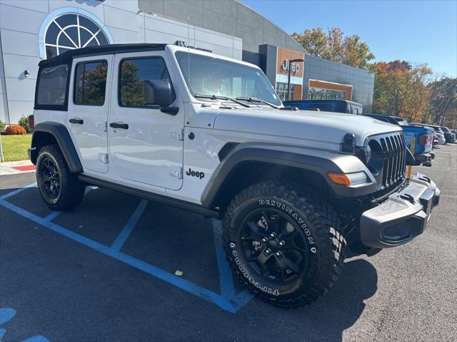 used 2021 Jeep Wrangler Unlimited car, priced at $35,868