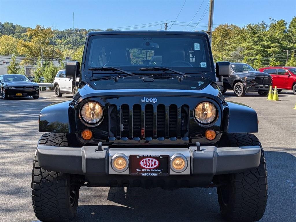 used 2014 Jeep Wrangler Unlimited car, priced at $18,290