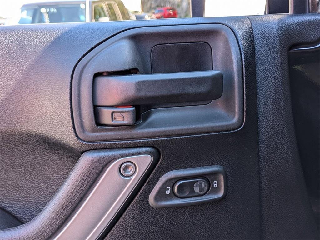 used 2014 Jeep Wrangler Unlimited car, priced at $18,290
