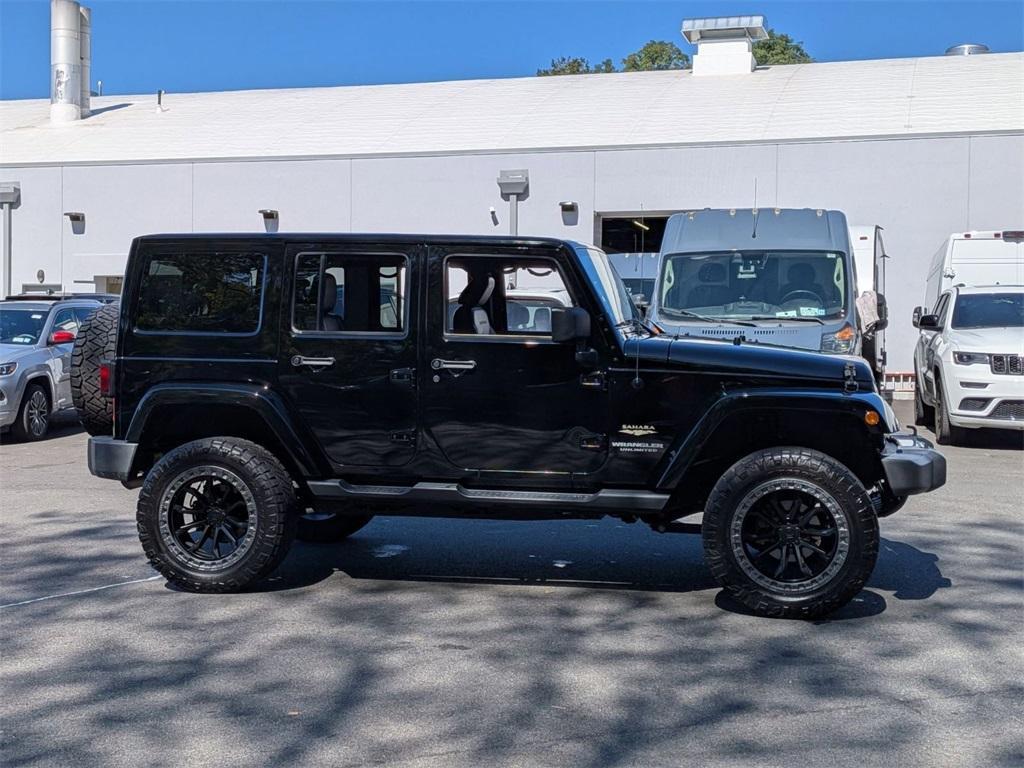 used 2014 Jeep Wrangler Unlimited car, priced at $18,290