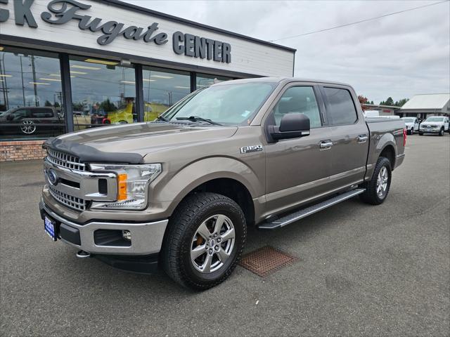 used 2018 Ford F-150 car, priced at $27,620