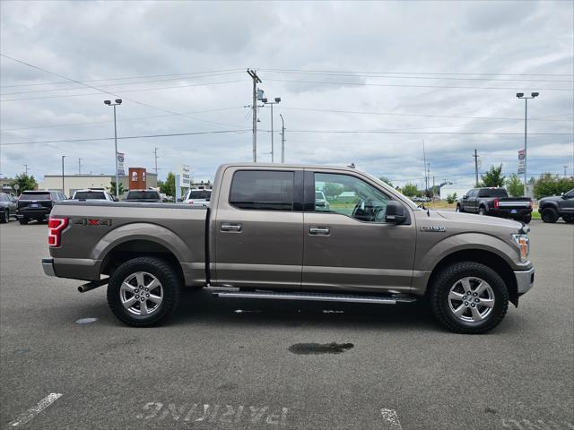 used 2018 Ford F-150 car, priced at $27,620