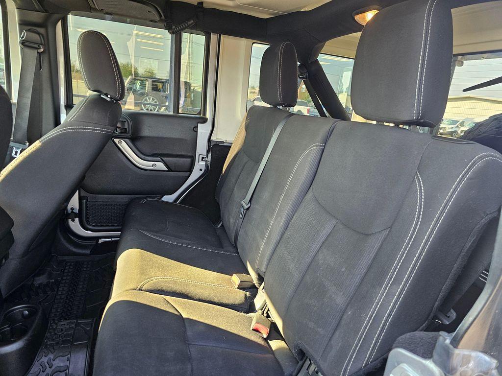 used 2018 Jeep Wrangler JK Unlimited car, priced at $25,997