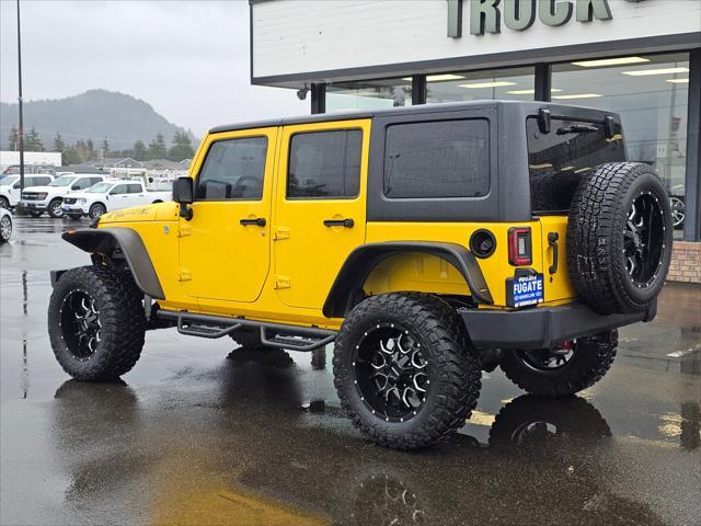 used 2015 Jeep Wrangler Unlimited car, priced at $23,999