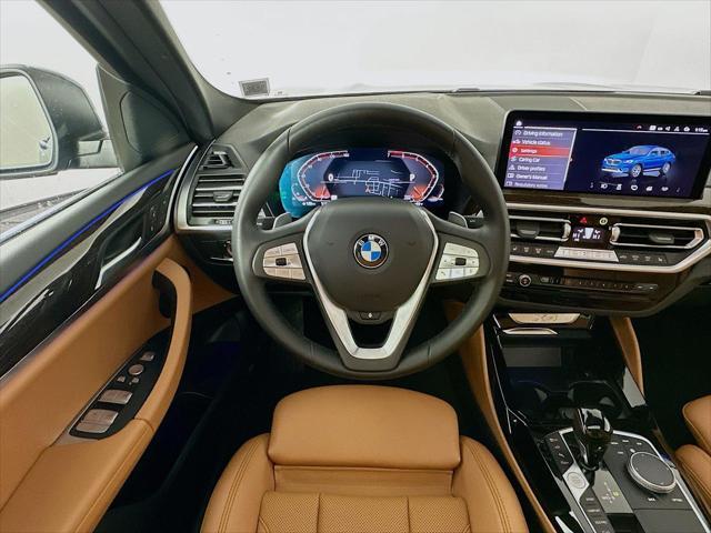 used 2022 BMW X4 car, priced at $39,270