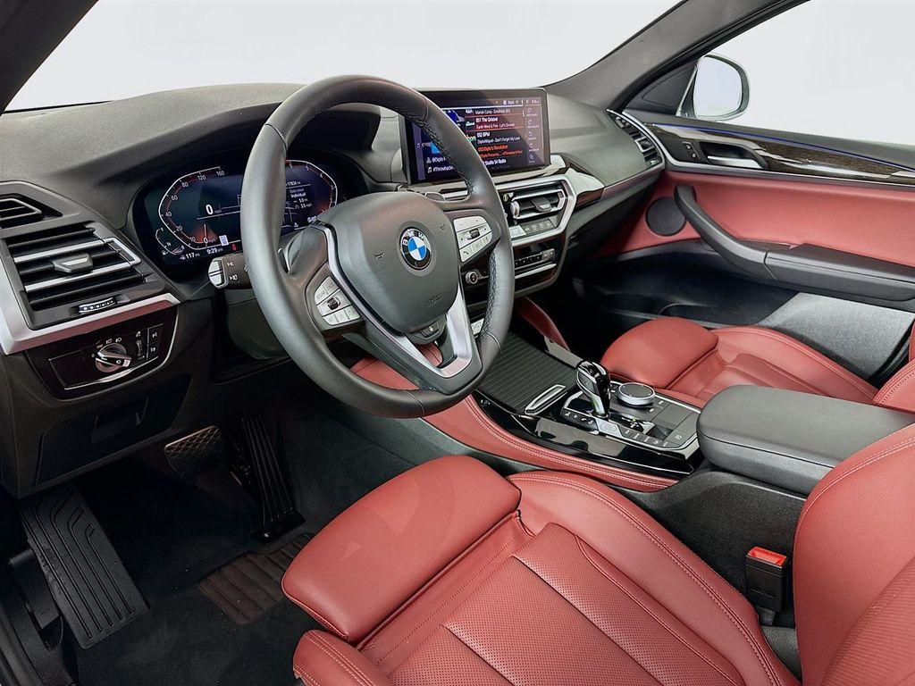 used 2025 BMW X4 car, priced at $52,500