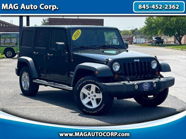 used 2013 Jeep Wrangler Unlimited car, priced at $17,995