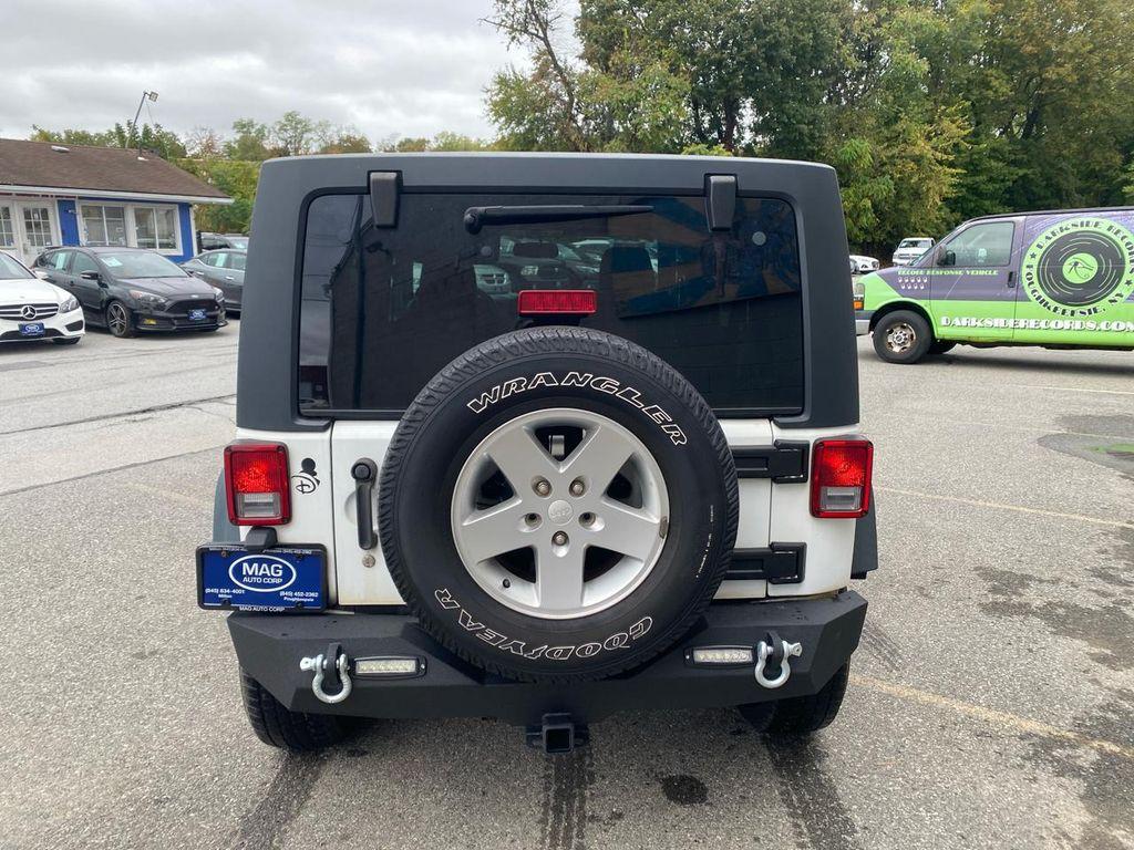 used 2014 Jeep Wrangler Unlimited car, priced at $17,995