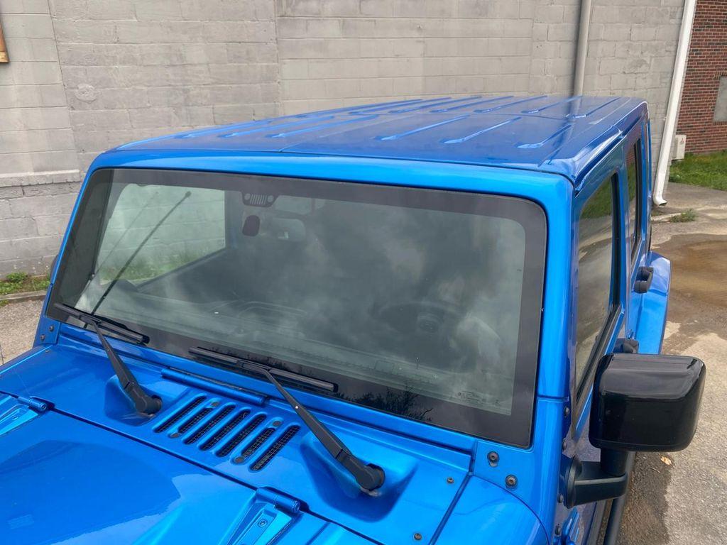 used 2015 Jeep Wrangler Unlimited car, priced at $16,995