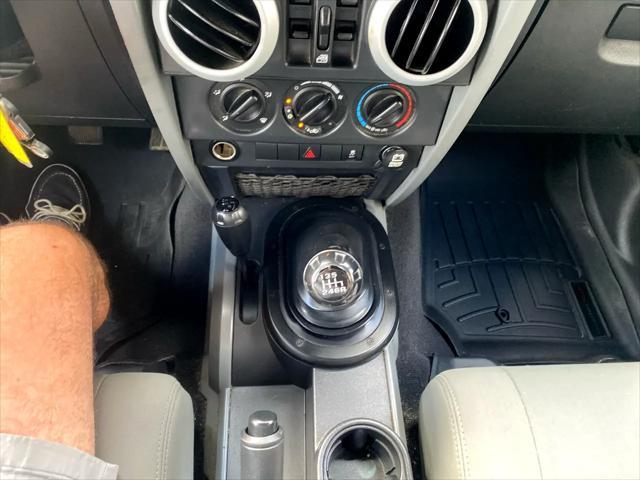 used 2010 Jeep Wrangler Unlimited car, priced at $14,995