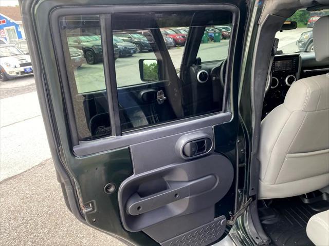 used 2010 Jeep Wrangler Unlimited car, priced at $14,995