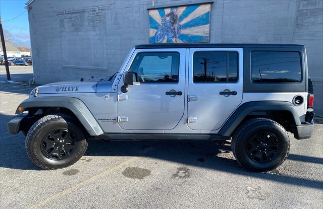 used 2015 Jeep Wrangler Unlimited car, priced at $15,995