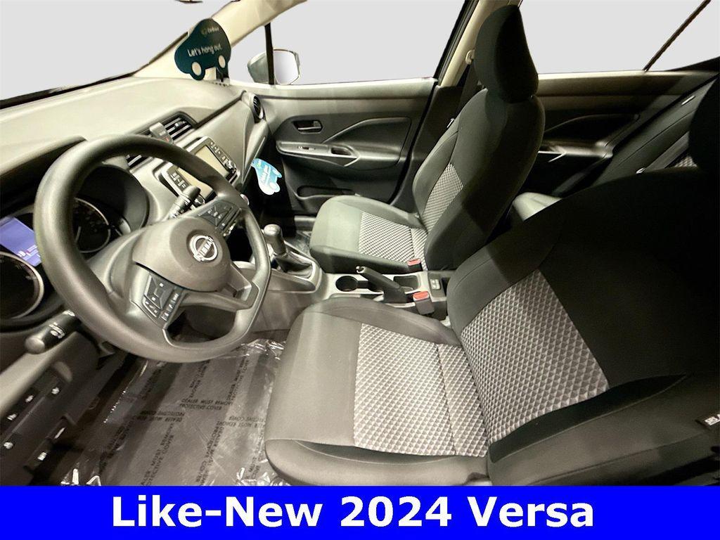 used 2024 Nissan Versa car, priced at $18,991