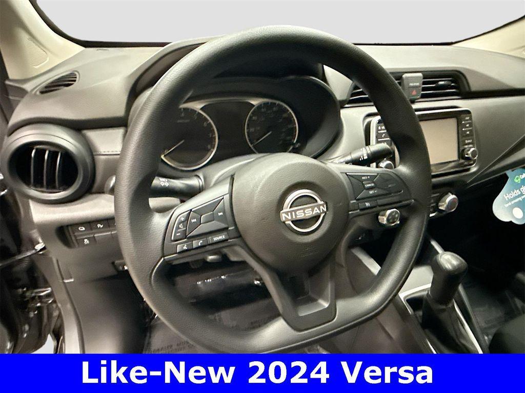 used 2024 Nissan Versa car, priced at $18,991