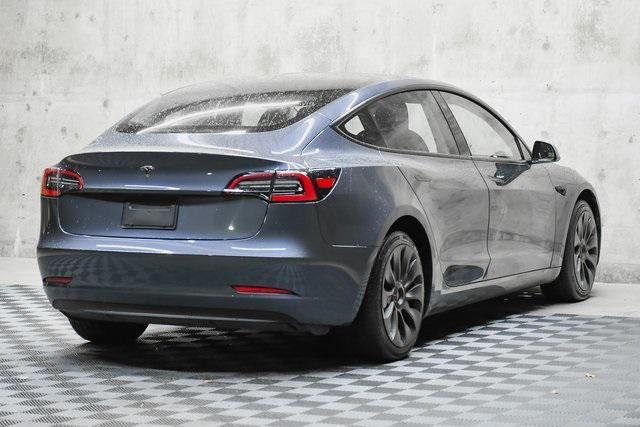 used 2023 Tesla Model 3 car, priced at $28,677