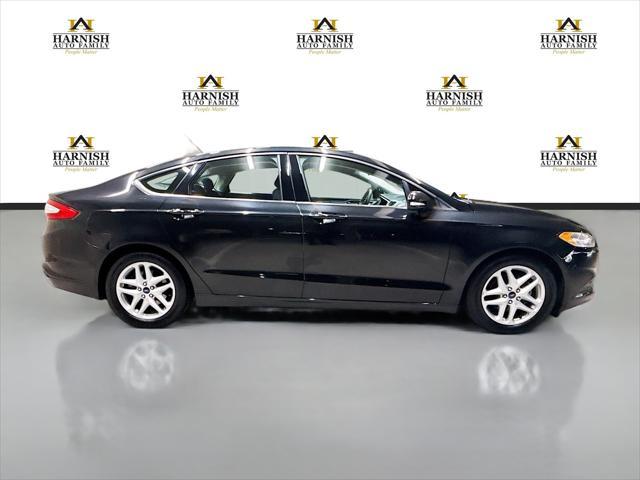 used 2015 Ford Fusion car, priced at $10,901