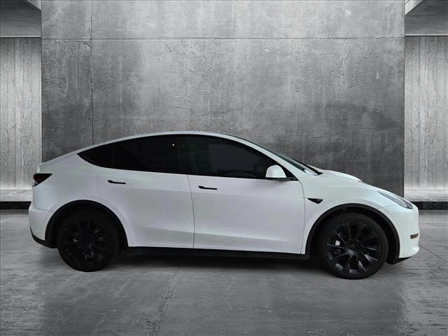 used 2024 Tesla Model Y car, priced at $38,529