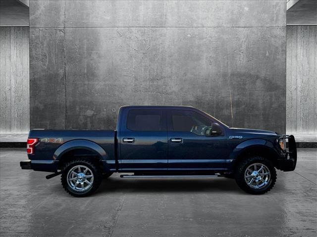 used 2018 Ford F-150 car, priced at $19,498