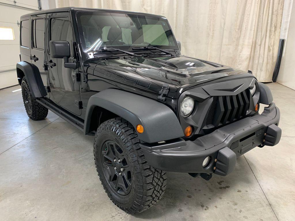 used 2013 Jeep Wrangler Unlimited car, priced at $17,299