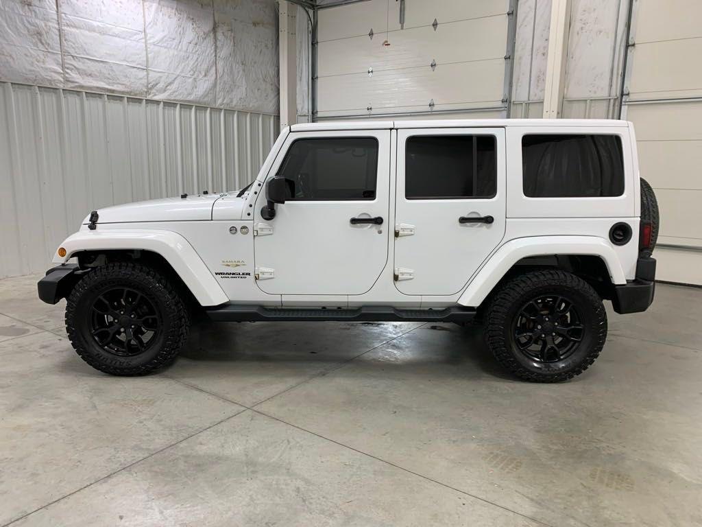 used 2015 Jeep Wrangler Unlimited car, priced at $17,238