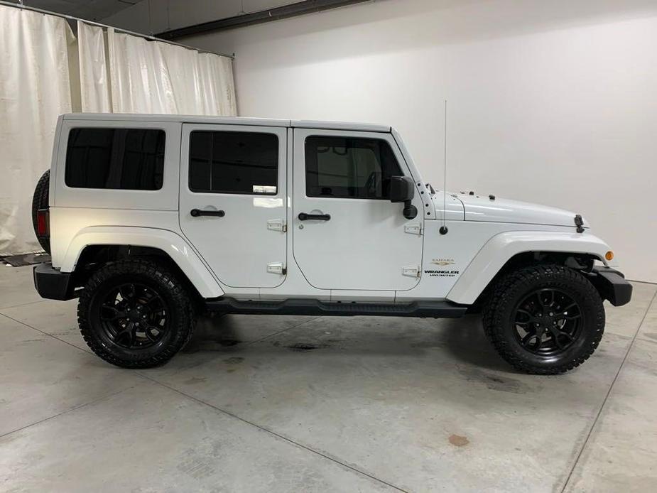 used 2015 Jeep Wrangler Unlimited car, priced at $17,238