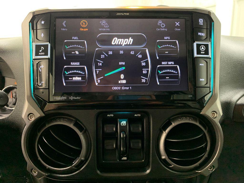 used 2016 Jeep Wrangler Unlimited car, priced at $17,993