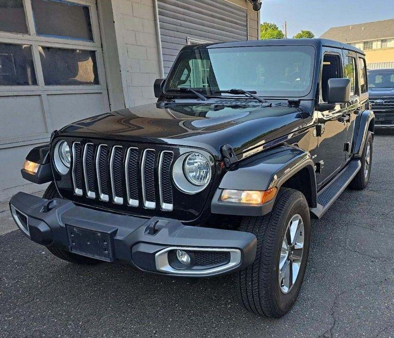 used 2021 Jeep Wrangler Unlimited car, priced at $24,139