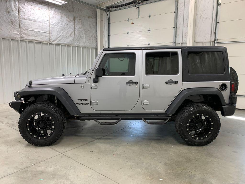 used 2015 Jeep Wrangler Unlimited car, priced at $16,799
