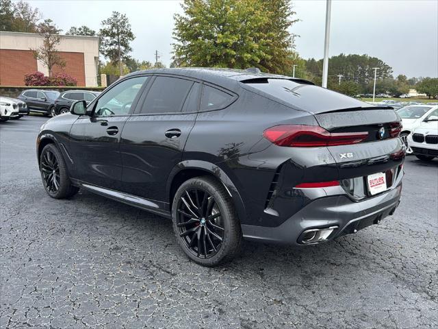 new 2025 BMW X6 car, priced at $90,285