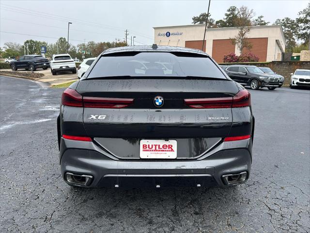 new 2025 BMW X6 car, priced at $90,285