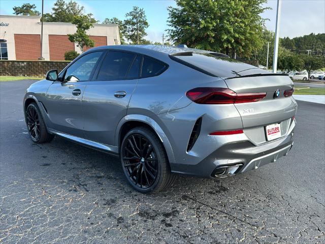 new 2025 BMW X6 car, priced at $90,285