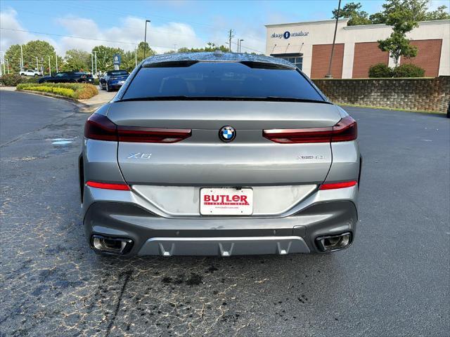 new 2025 BMW X6 car, priced at $90,285