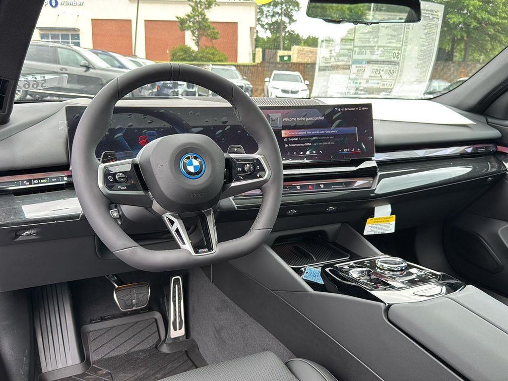 new 2026 BMW 550e car, priced at $85,465