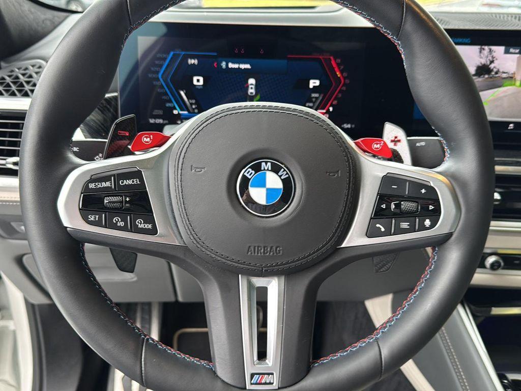 used 2024 BMW X6 M car, priced at $117,900