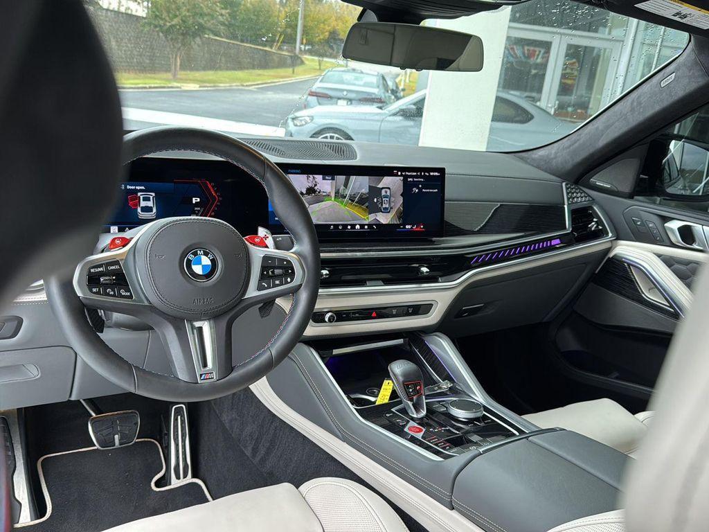 used 2024 BMW X6 M car, priced at $117,900
