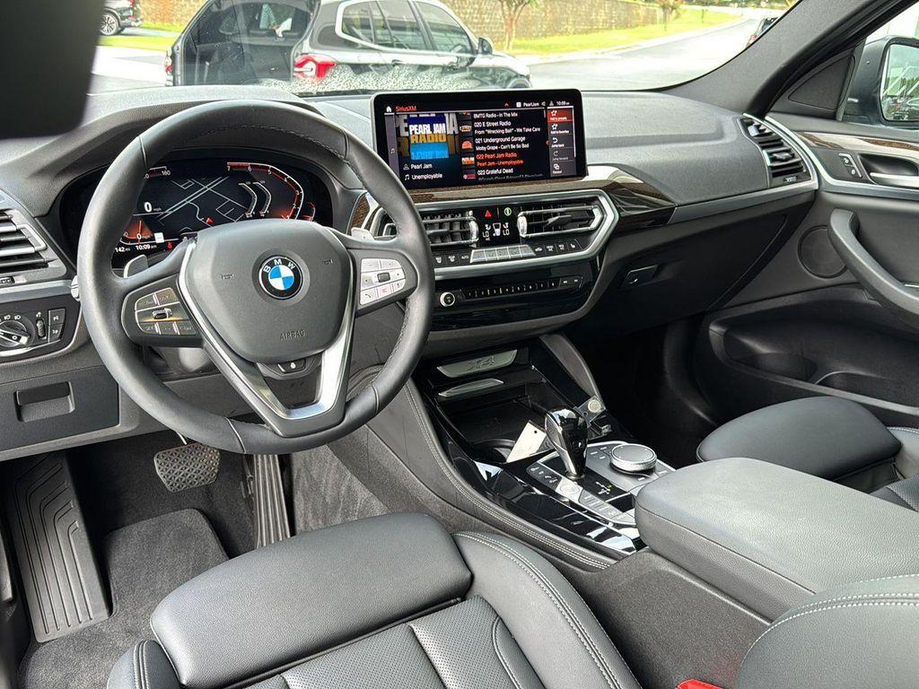 used 2025 BMW X4 car, priced at $51,900